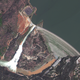 The two spillways during the overflow (main at right, auxiliary at left). (Image: DigitalGlobe)